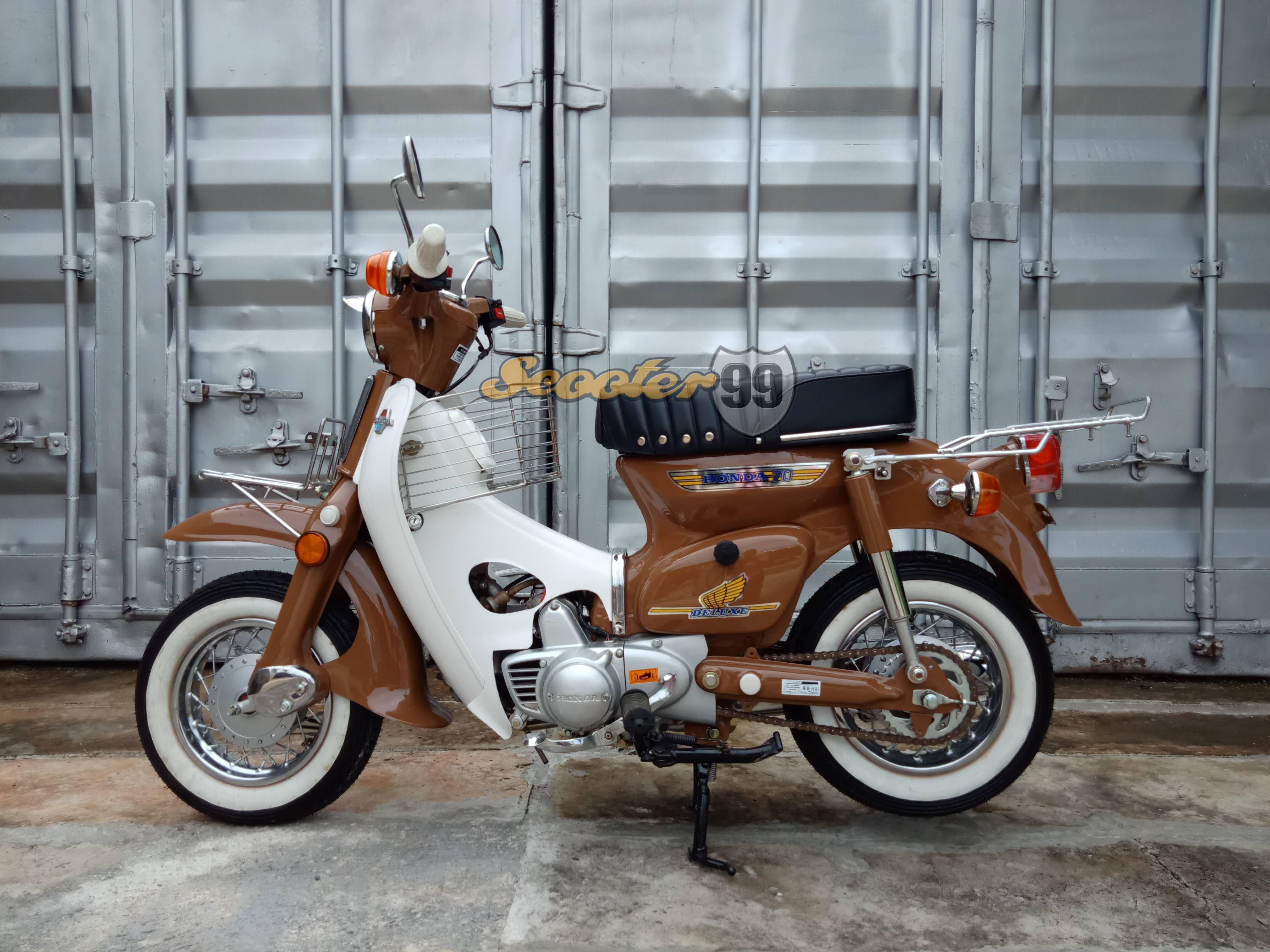 Side profile of Honda Mini Cup Brown with chrome spoke wheels